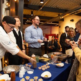 Culinary arts students serve their seaweed creations to attendees during Urchin Tank, 2022.