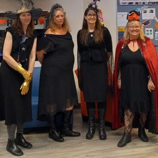 Four women in Halloween costumes