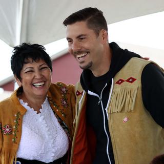 Woman and a man dance on a stage