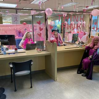 Cubicles covered in pink decorations for Halloween