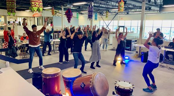 A group of students takes part in an Afro dance fusion class together