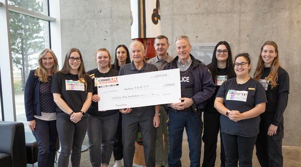 Group of VIU Nursing students accept a cheque