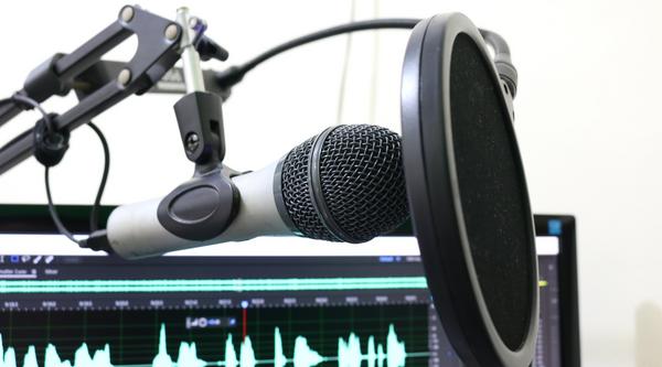 A black podcast microphone.