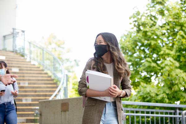 VIU students wearing mask by the library