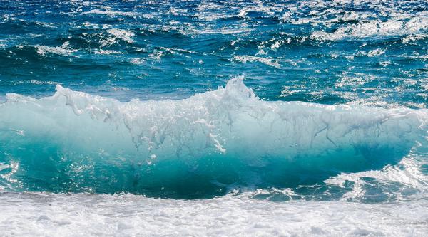 A closeup of an ocean wave