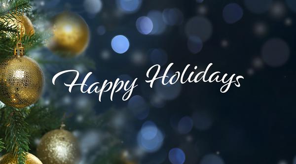 Happy holidays in text with background of ornaments on a tree