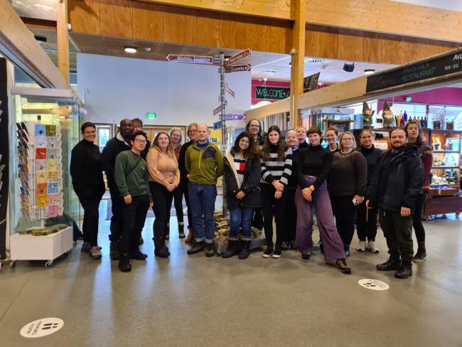 Photo of a group standing in a touristy location in Finland