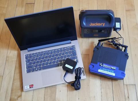 An offline pack consisting of a local computer, router and portable power station.